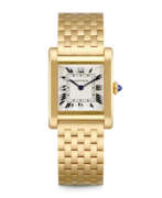 Yellow gold. CARTIER. A RARE 18K GOLD WRISTWATCH WITH BRACELET