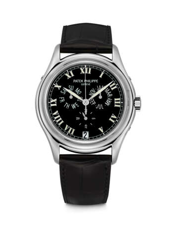 PATEK PHILIPPE. A PLATINUM AUTOMATIC ANNUAL CALENDAR WRISTWATCH WITH SWEEP CENTRE SECONDS AND 24 HOUR INDICATION - Foto 1