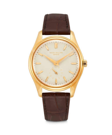 PATEK PHILIPPE. AN 18K GOLD AUTOMATIC WRISTWATCH WITH CREAM-COLOURED ENAMEL DIAL - фото 1