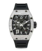 Richard Mille. RICHARD MILLE. AN 18K WHITE GOLD, DIAMOND AND BLACK GEMSTONE-SET AUTOMATIC SKELETONISED WRISTWATCH WITH SWEEP CENTRE SECONDS AND DATE