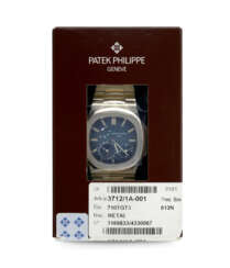 PATEK PHILIPPE. AN EXTREMELY RARE STAINLESS STEEL AUTOMATIC WRISTWATCH WITH POWER RESERVE, MOON PHASES, DATE AND BRACELET, DOUBLE SEALED