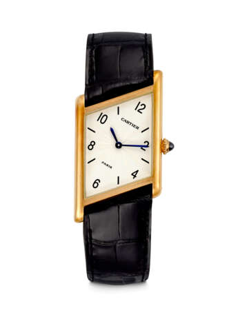 CARTIER. AN UNUSUAL 18K GOLD LIMITED EDITION ASYMMETRICAL WRISTWATCH - фото 1