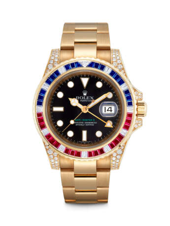 ROLEX. A RARE 18K GOLD, DIAMOND, SAPPHIRE AND RUBY-SET AUTOMATIC DUAL TIME WRISTWATCH WITH SWEEP CENTRE SECONDS, DATE AND BRACELET - фото 1