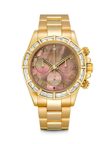 ROLEX. AN 18K GOLD AND BAGUETTE-CUT DIAMOND-SET AUTOMATIC CHRONOGRAPH WRISTWATCH WITH BRACELET AND MOTHER-OF-PEARL DIAL - photo 1