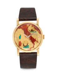 UNIVERSAL. AN 18K GOLD WRISTWATCH WITH ENAMEL DIAL