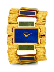 PIAGET. AN ATTRACTIVE 18K GOLD, LAPIS LAZULI AND JADEITE BRACELET WATCH