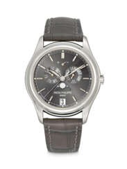 PATEK PHILIPPE. A PLATINUM AUTOMATIC ANNUAL CALENDAR WRISTWATCH WITH SWEEP CENTRE SECONDS, MOON PHASES AND POWER RESERVE