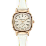 PATEK PHILIPPE. A LADY’S ELEGANT 18K PINK GOLD AND DIAMOND-SET CUSHION SHAPED WRISTWATCH - фото 1