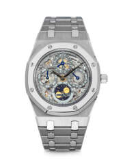 AUDEMARS PIGUET. AN EXTREMELY RARE PLATINUM AND STAINLESS STEEL LIMITED EDITION AUTOMATIC SKELETONISED PERPETUAL CALENDAR WRISTWATCH WITH LEAP YEAR INDICATOR, MOON PHASES AND BRACELET, MADE TO CELEBRATE THE 25TH ANNIVERSARY OF ROYAL OAK