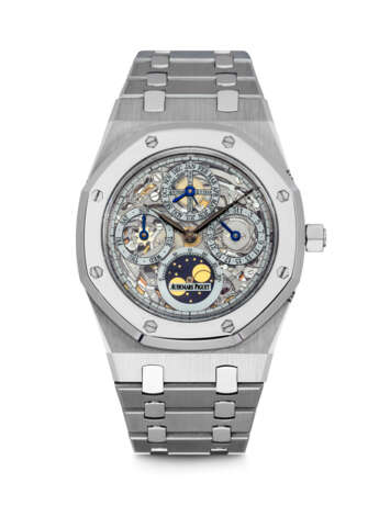 AUDEMARS PIGUET. AN EXTREMELY RARE PLATINUM AND STAINLESS STEEL LIMITED EDITION AUTOMATIC SKELETONISED PERPETUAL CALENDAR WRISTWATCH WITH LEAP YEAR INDICATOR, MOON PHASES AND BRACELET, MADE TO CELEBRATE THE 25TH ANNIVERSARY OF ROYAL OAK - photo 1