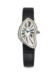 CARTIER. AN EXTREMELY RARE PLATINUM ASYMMETRICAL WRISTWATCH