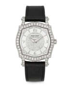 Roger Dubuis. ROGER DUBUIS. AN 18K WHITE GOLD AND DIAMOND-SET AUTOMATIC WRISTWATCH