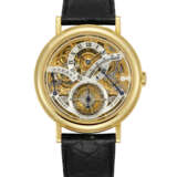 BREGUET. AN 18K GOLD SKELETONISED TOURBILLON WRISTWATCH WITH RETROGRADE 24 HOUR INDICATION AND POWER RESERVE - Foto 1