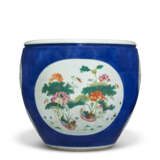 A CHINESE BLUE-GROUND FAMILLE ROSE JARDINIERE - photo 4