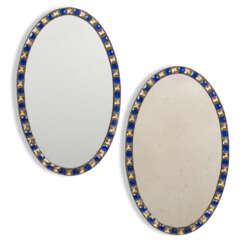 A PAIR OF IRISH BLUE AND CLEAR GLASS OVAL MIRRORS