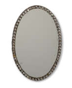 England. AN IRISH GEORGE III CUT-GLASS OVAL MIRROR