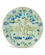 Ceramic. AN IZNIK POTTERY DISH