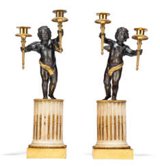 A PAIR OF FRENCH ORMOLU AND PATINATED-BRONZE AND WHITE MARBLE TWO-LIGHT CANDELABRA