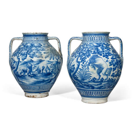 A PAIR OF TALAVERA MAIOLICA LARGE OVIFORM BLUE AND WHITE TWO-HANDLED VASES - photo 1