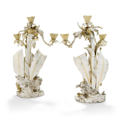 A PAIR OF VICTORIAN PARCEL-GILT SILVER-PLATED THREE-LIGHT CANDELABRA - фото 2