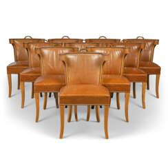 A SET OF TEN MODERN OAK 'CASINO' DINING-CHAIRS