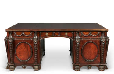 AN ENGLISH MAHOGANY PARTNER'S DESK