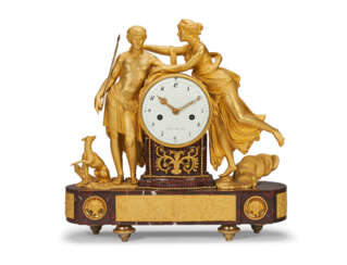 A DIRECTOIRE ORMOLU AND ROUGE GRIOTTE MARBLE MANTEL CLOCK