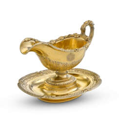 A RUSSIAN SILVER-GILT SAUCEBOAT AND STAND FROM THE ORLOFF SERVICE