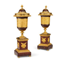 A PAIR OF DIRECTOIRE ORMOLU AND ROUGE GRIOTTE MARBLE URNS