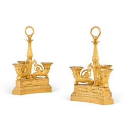 A PAIR OF RESTAURATION ORMOLU THREE-LIGHT CANDELABRA