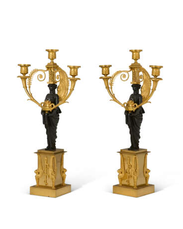 A PAIR OF EMPIRE ORMOLU AND PATINATED BRONZE THREE-LIGHT CANDELABRA - photo 3