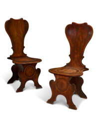 A PAIR OF GEORGE II MAHOGANY 'SGABELLO' HALL CHAIRS