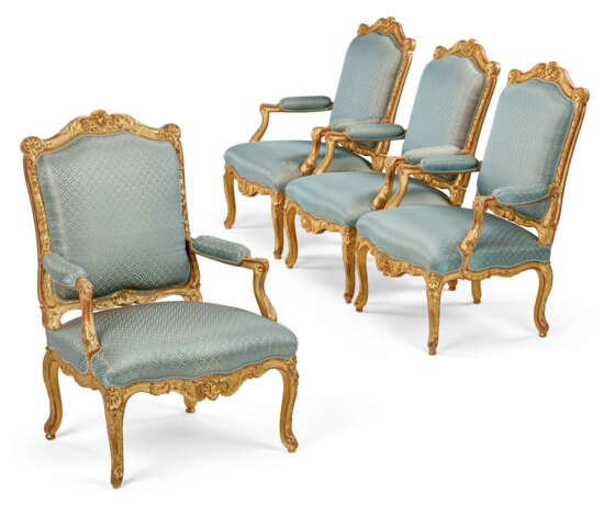 A SET OF FOUR EARLY LOUIS XV GILT-WALNUT FAUTEUILS - photo 1