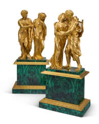 A PAIR OF EMPIRE ORMOLU AND MALACHITE FIGURAL GROUPS