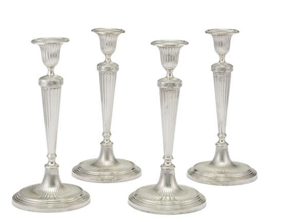 A SET OF FOUR GEORGE III SILVER CANDLESTICKS - photo 1