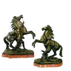 Sculptures jumelees Chevaux Marley. 