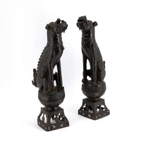 PAIR OF IRON SHISHI GUARDING LIONS ON PEDESTALS - photo 1