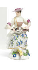 Meissen. SMALL PORCELAIN FIGURINE OF THE WOMAN WITH HURDY-GURDY