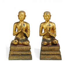 PAIR OF SITTING BRONZE ADORANTS