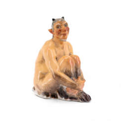 Meissen. PORCELAIN FIGURINE OF A SEATED FAUN