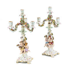 Meissen. PAIR OF PORCELAIN GIRANDOLES WITH SEATED CUPIDS AS ALLEGORIES OF THE SEASONS