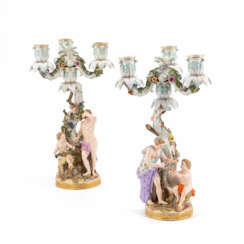 Meissen. PAIR OF PORCELAIN CANDLESTICKS WITH FIGURATIVE DECORATION AS ALLEGORIES OF SPRING AND AUTUMN