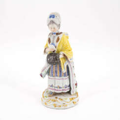 Meissen. PORCELAIN FIGURINE OF A LADY WITH A MUFF