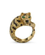 Coloured diamond. CARTIER COLOURED DIAMOND, EMERALD AND ONYX 'TIGER' RING