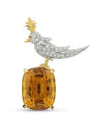 Tiffany & Co.. TIFFANY & CO. BY JEAN SCHLUMBERGER CITRINE, DIAMOND AND COLOURED SAPPHIRE 'BIRD ON A ROCK' BROOCH