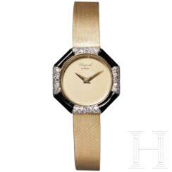 Goldene Chopard-Frauenarmbanduhr mit Diamanten