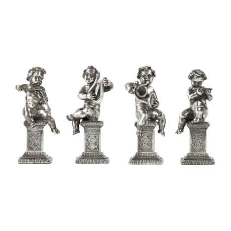 Four funny figures of putti musicians in silver. - фото 1