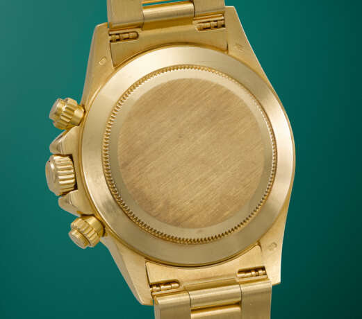 ROLEX. A RARE AND ATTRACTIVE 18K GOLD AUTOMATIC CHRONOGRAPH WRISTWATCH WITH BRACELET - Foto 3