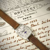 BREGUET. A POSSIBLY UNIQUE, OUTSTANDINGLY RARE, HISTORICALLY IMPORTANT AND PREVIOUSLY UNRECORDED 18K WHITE GOLD TONNEAU-SHAPED PERPETUAL CALENDAR WRISTWATCH WITH RETROGRADE DATE AND MOON PHASES - PROBABLY THE EARLIEST PERPETUAL CALENDAR WRISTWATCH WITH RE - photo 3