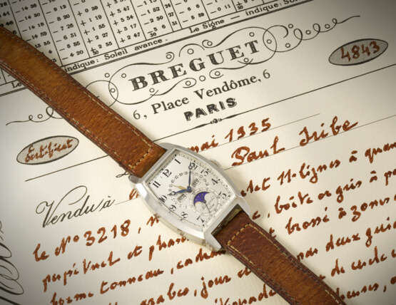 BREGUET. A POSSIBLY UNIQUE, OUTSTANDINGLY RARE, HISTORICALLY IMPORTANT AND PREVIOUSLY UNRECORDED 18K WHITE GOLD TONNEAU-SHAPED PERPETUAL CALENDAR WRISTWATCH WITH RETROGRADE DATE AND MOON PHASES - PROBABLY THE EARLIEST PERPETUAL CALENDAR WRISTWATCH WITH RE - photo 3